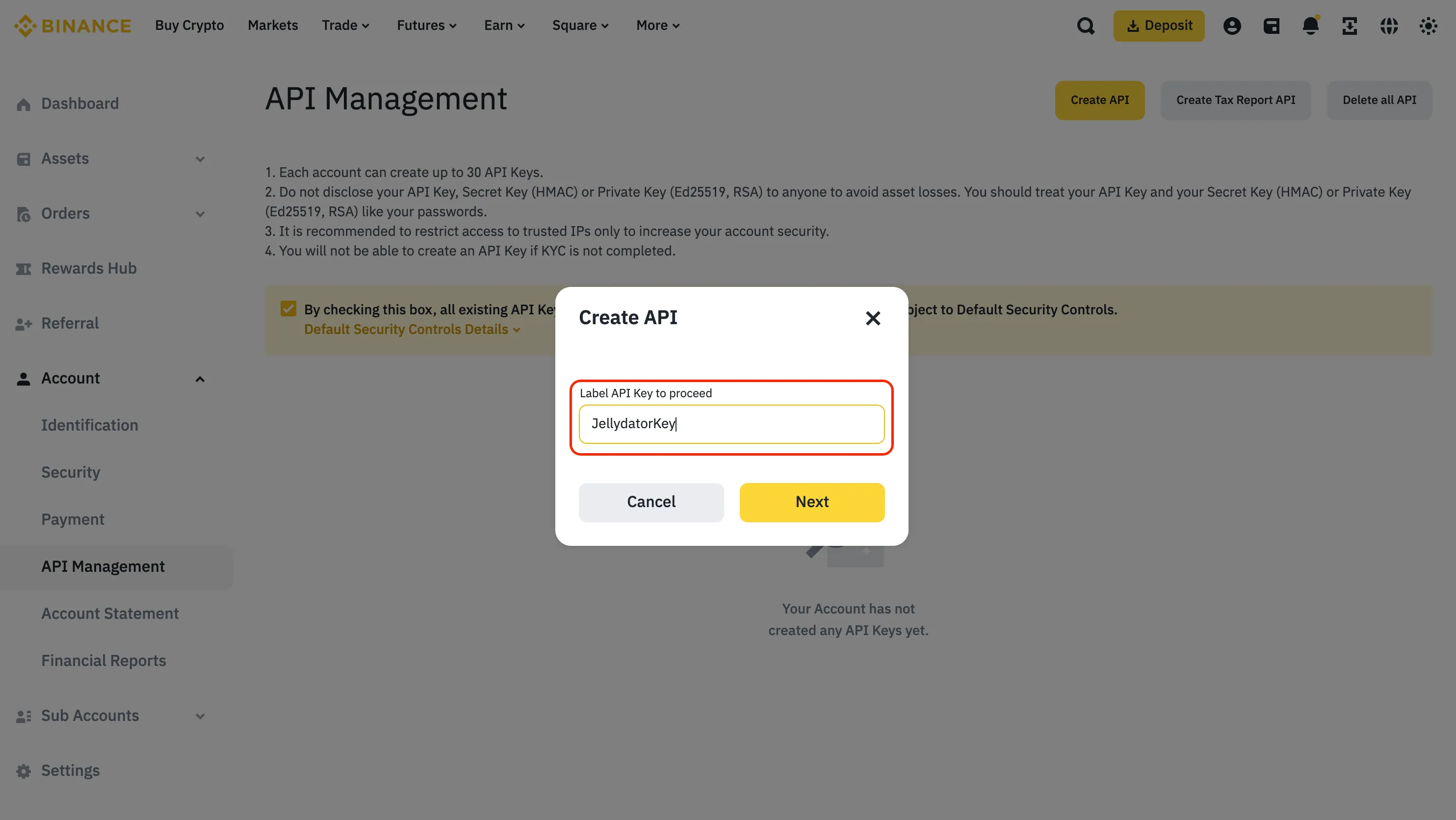 An image of the Binance website with the API key label input field highlighted.