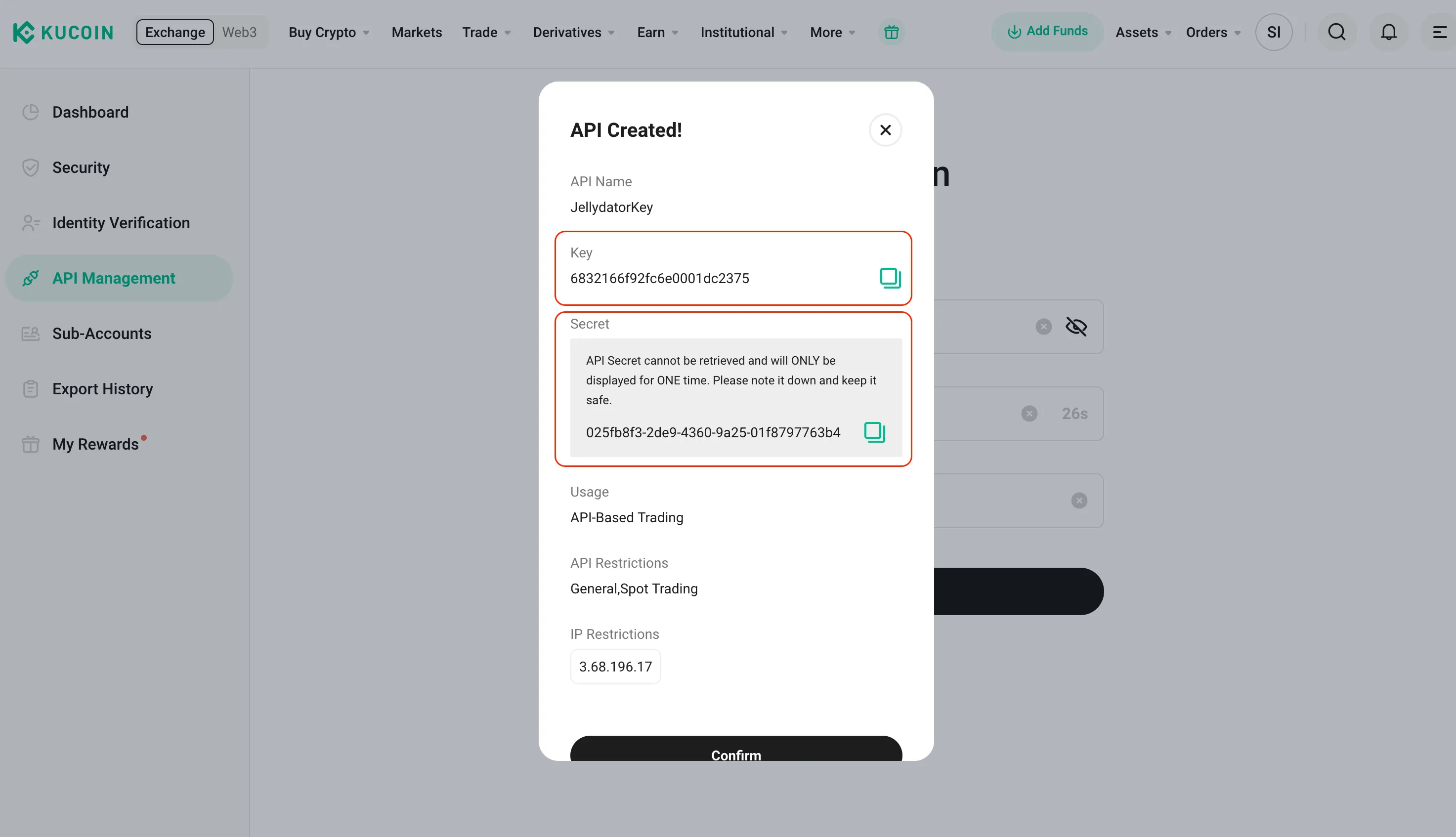 The KuCoin platform with the key and secret values highlighted.