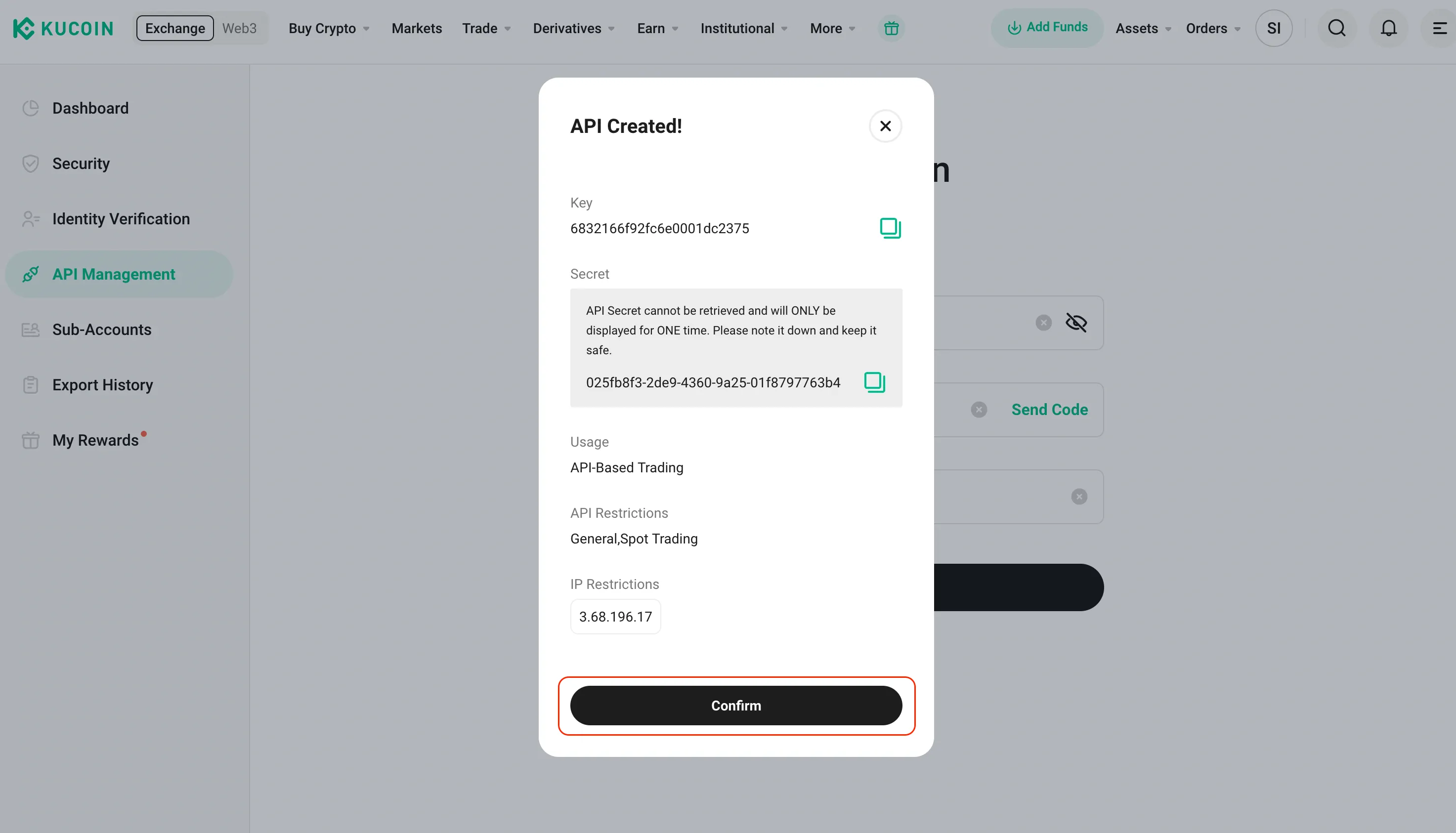 The KuCoin platform with the 'confirm' button highlighted.