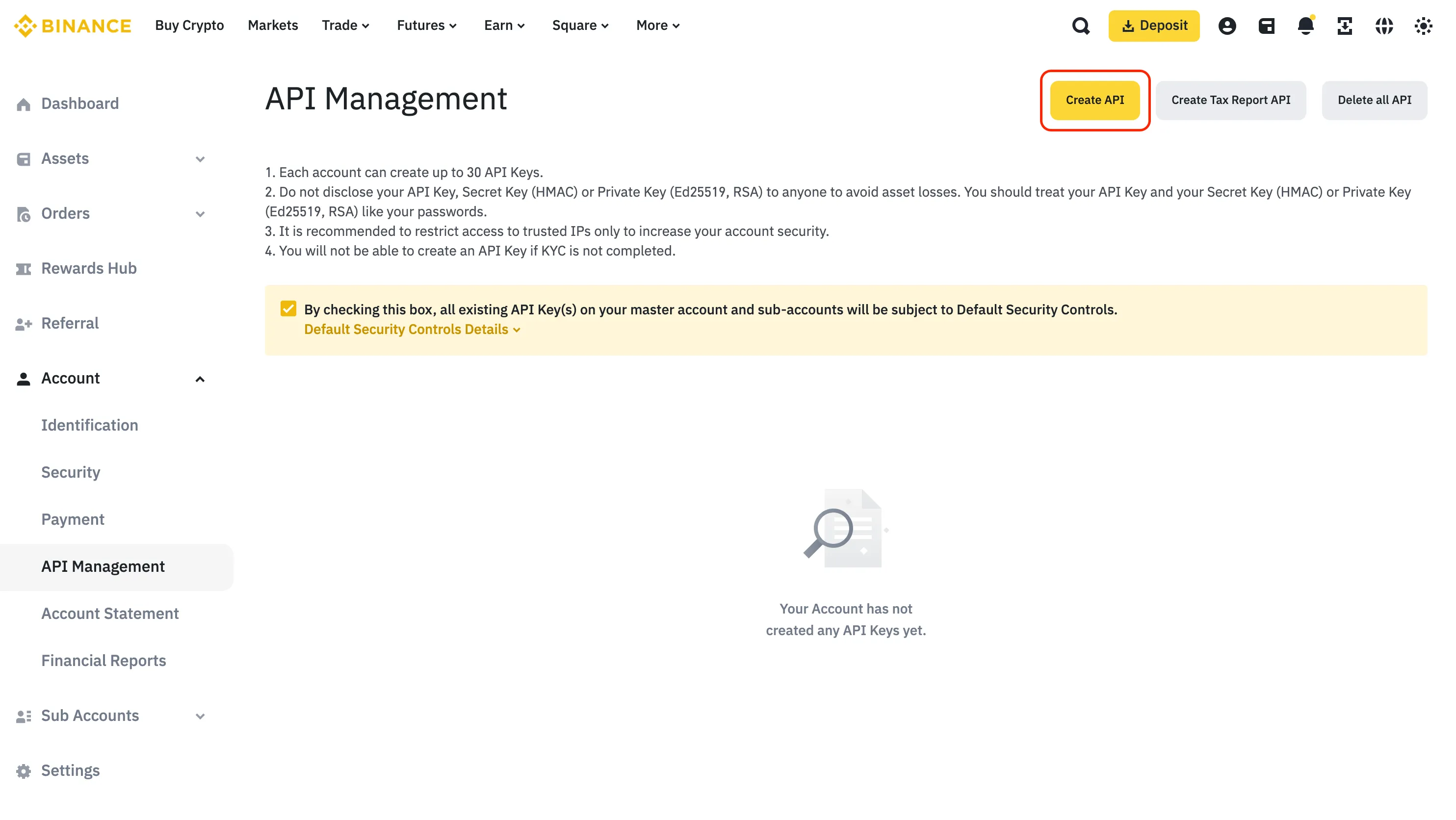 An image of the Binance website with the API key creation button highlighted.